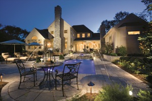 masonry home with patio and pool